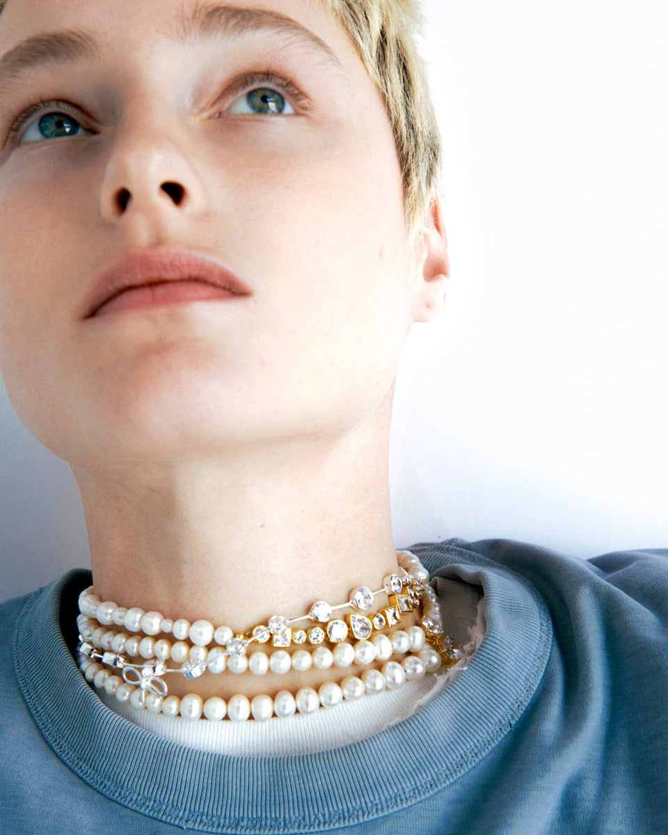 A World Locked by Politics and Money - Zirconia and Recycled Silver Necklace