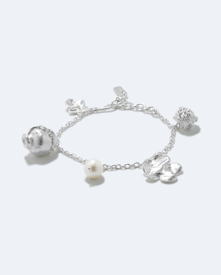 Journey Through Memory - Pearl and Silver Plated Charm Bracelet