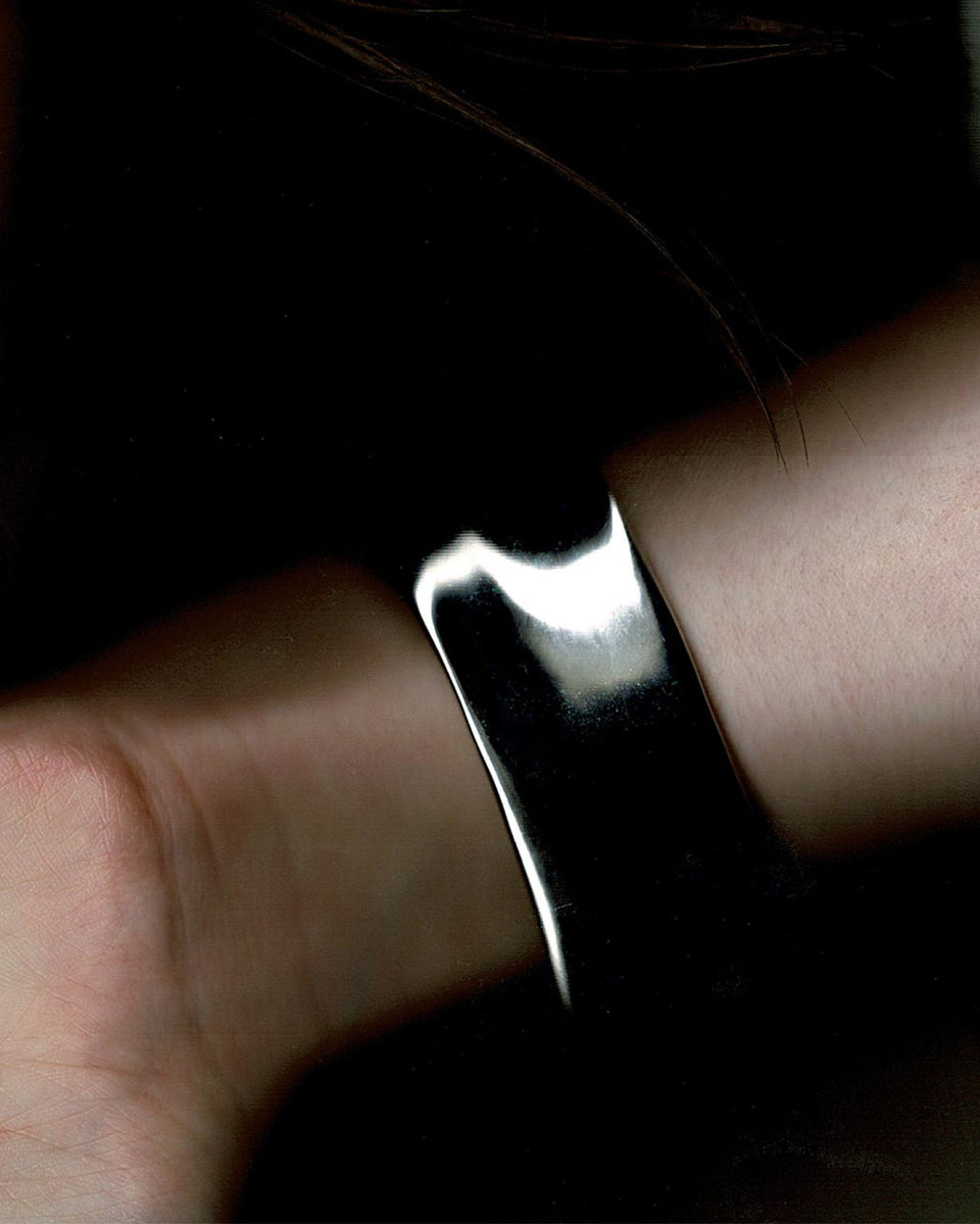 Something of Vast Importance is Being Communicated Just Out of Earshot - Rhodium Plated Cuff