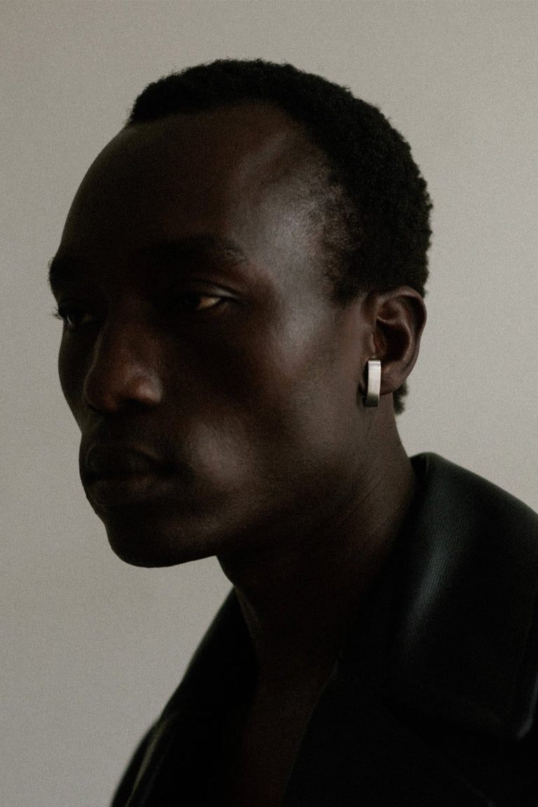 The Art of Sweeping Things Under the Rug - Single Earring